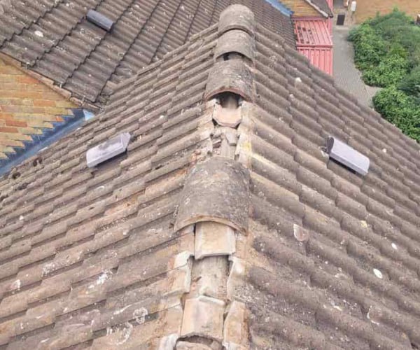 This is a photo if a roof ridge which has missing tiles. The ridge tiles are being replaced by LKN Roofing Shortstown